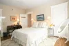 Master Bedroom with queen bed and nightstand