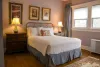 Master Bedroom with queen bed and nightstand
